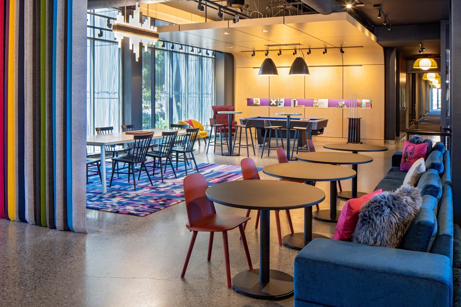Social dining and game area with banquette seating
