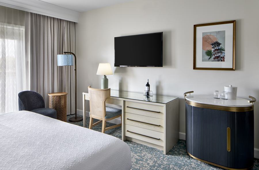 King guest room work area and media console