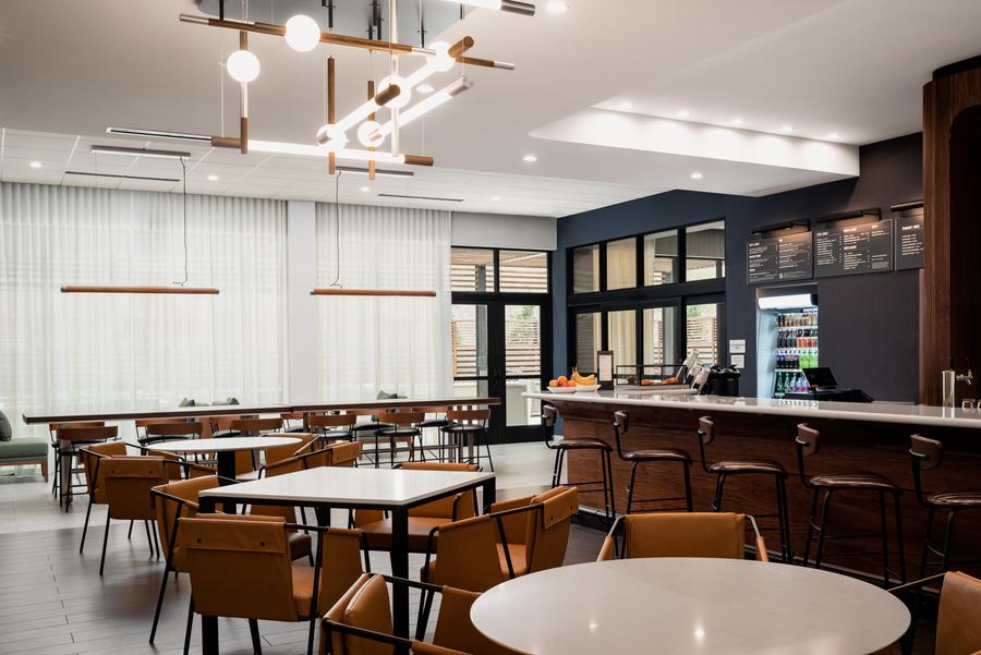 Dining room with linear pendant lighting