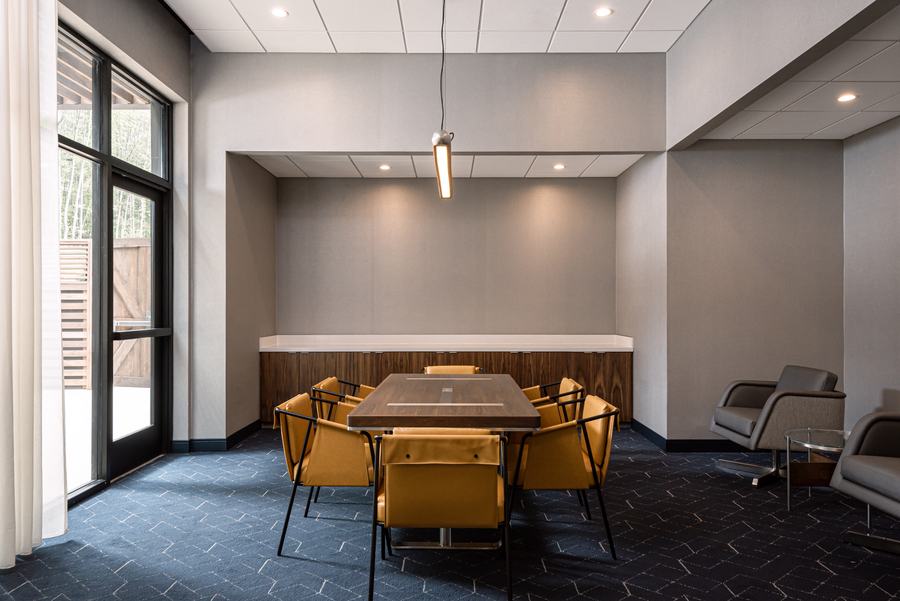 Boardroom with gold upholstered chairs