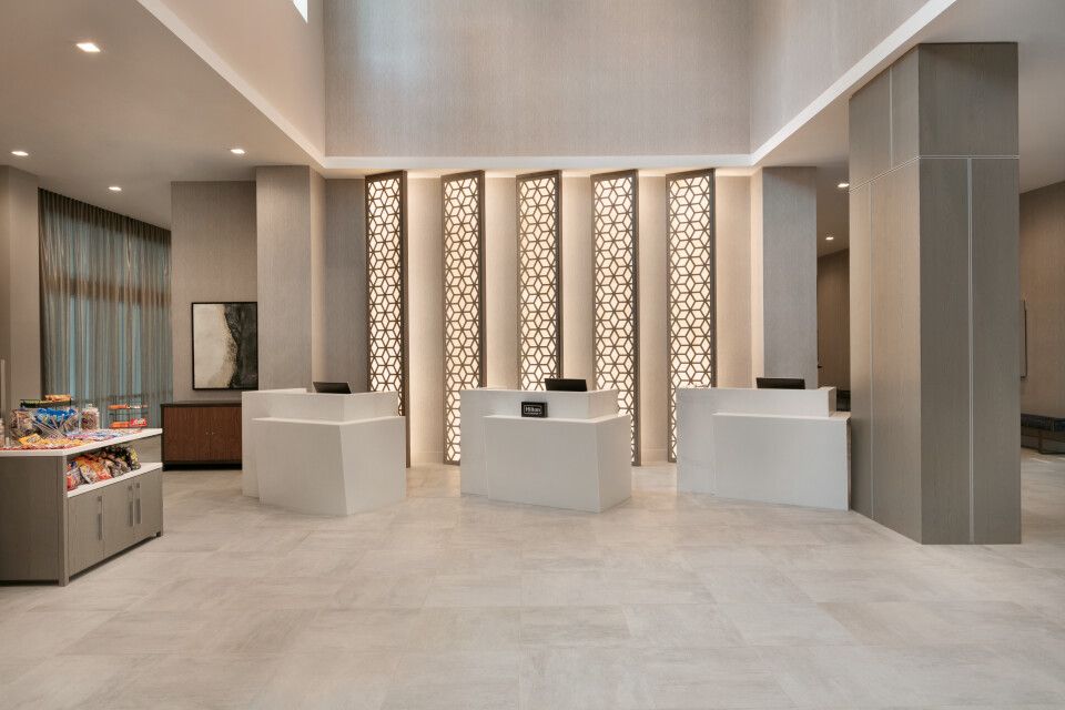 Front desk with screened lighting panels