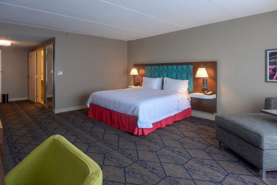 Accessible king room with lounge chair
