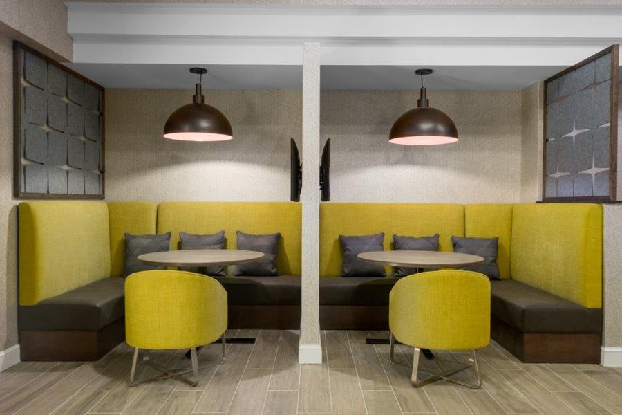 Booth seating with yellow upholstery