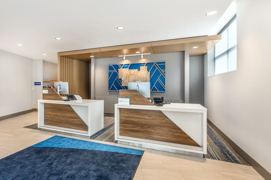 Front desk with blue feature wall