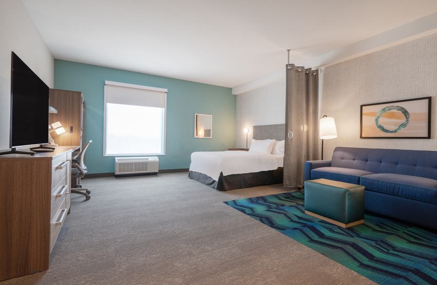 Studio suite with sofa and kitchenette