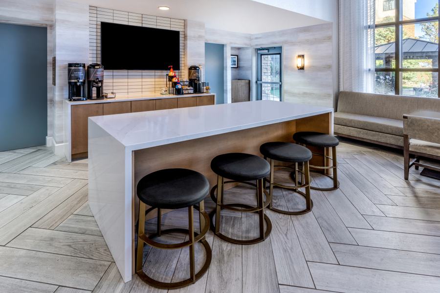 Kitchen island with stools in the lobby