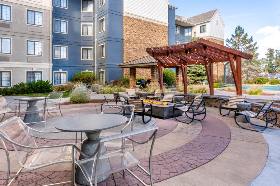 Outdoor patio with pergola and fire pit