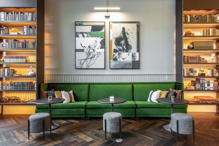 Library lounge with emerald banquette