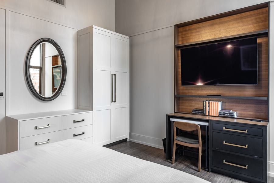 Guest room media wall and wardrobe